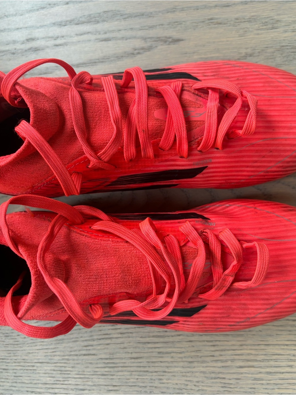 F50 Adidas coral cleats